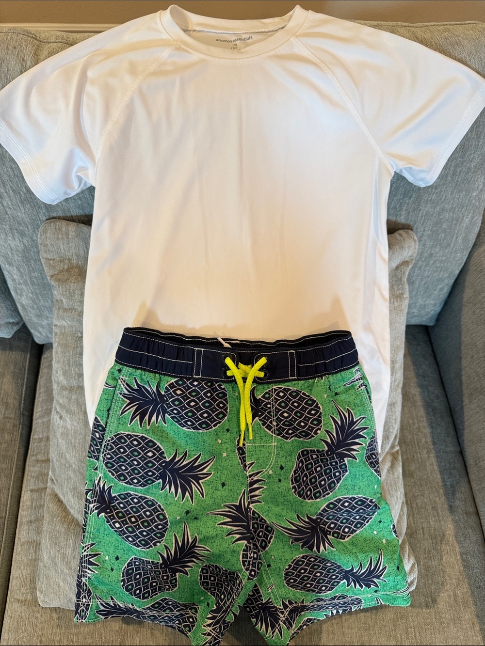 Gap Kids swim trunks (6/7) & rash guard (10). Trunks are lined &adjustable .